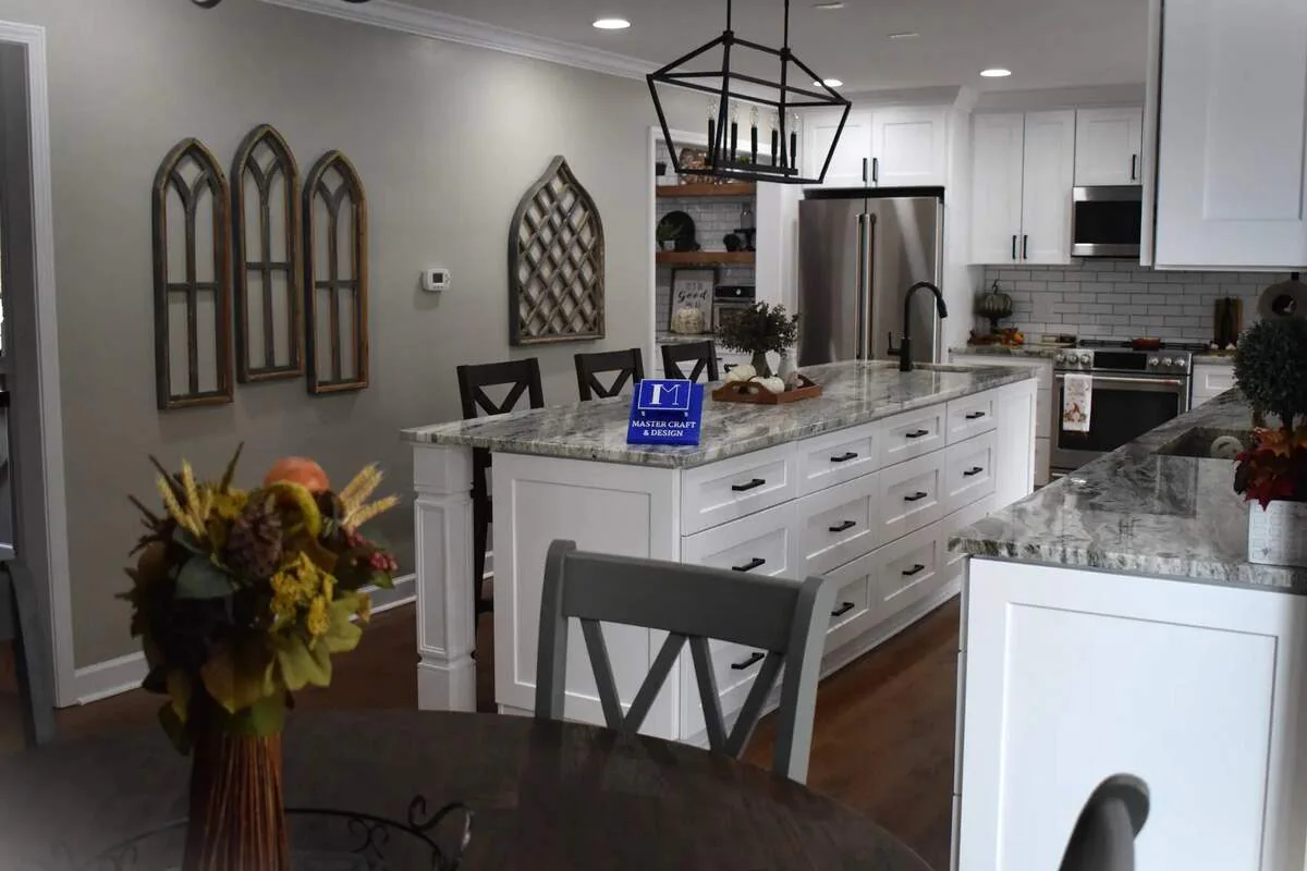 Detailed completed kitchen cabinetry and stone counters